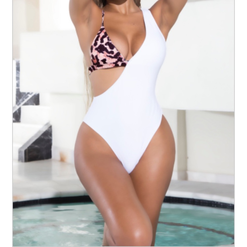 Size medium white and cheetah one piece